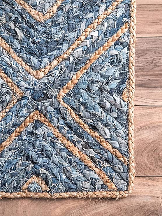 Handwoven natural jute and denim braided area rug with diamond design, organic earthy texture for modern, bohemian, and coastal interiors